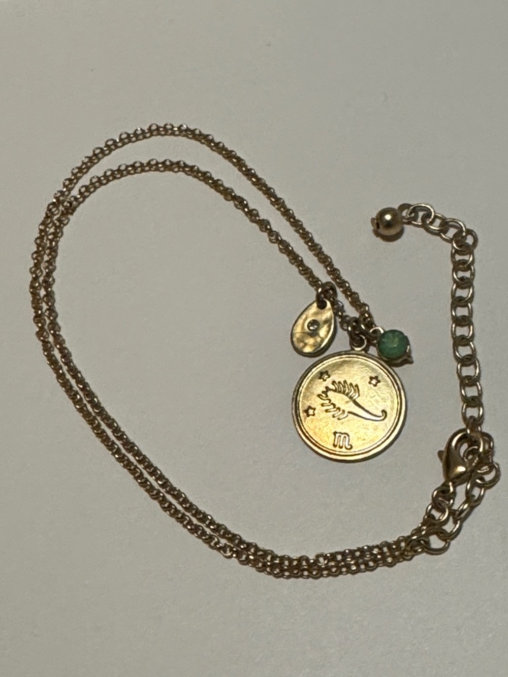 Vintage Gold Zodiac Pendant Necklace with Green Accent